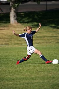 Soccer player wearing an ACL brace to avoid surgery for an ACL tear