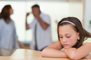 Girl showing signs of youth sports burnout