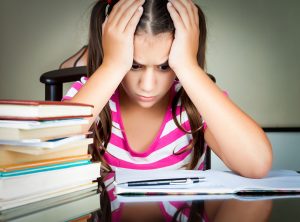 Girl frustrated with schoolwork