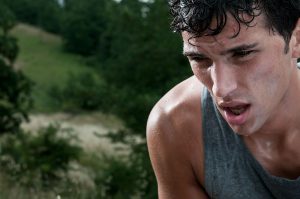 Runner exhausted from exercise in hot weather