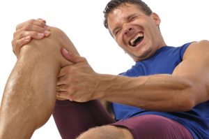 Man with pain from patellar tendon tear