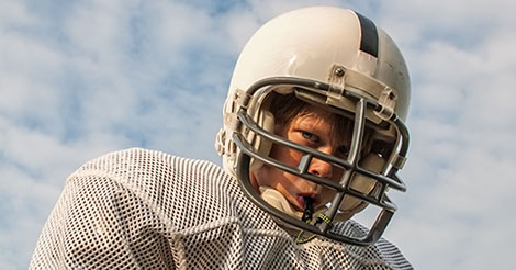 Does the brand, model or age of a football helmet matter for preventing