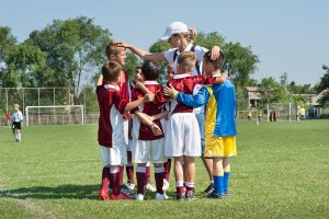 How many games each week should young soccer players play?
