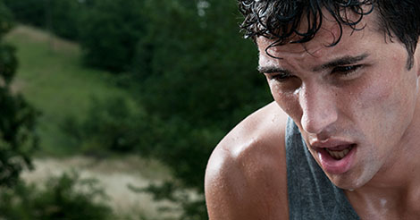 Runner exhausted taking breath