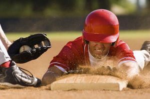 How should MLB address injuries on wet bases?