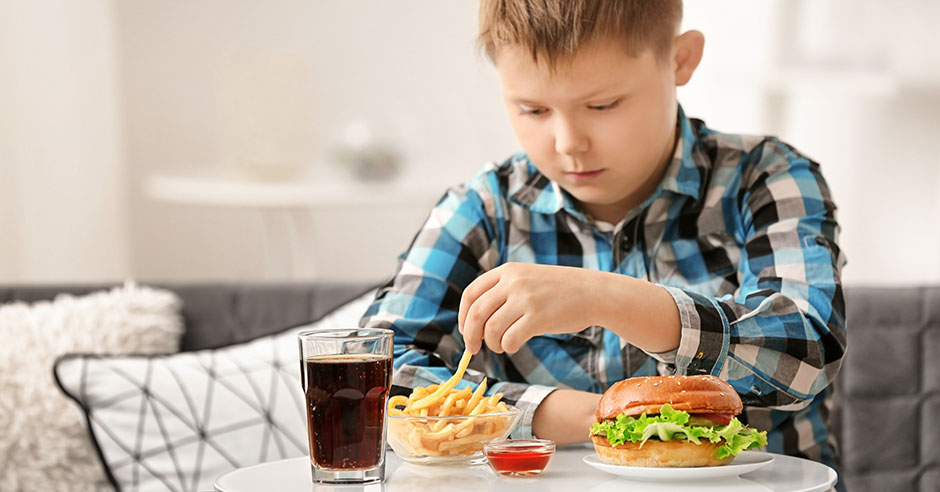 Watch for warning signs of an eating disorder in your kids