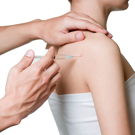 Doctor injects patient's shoulder